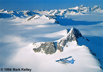 A floatplane cruises above the giant Juneau Icefield  – Image 2033